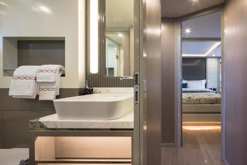 Slide: The Image of Luxurious bathroom and bedroom interior on a 2027 Sirena 78 yacht. - 35