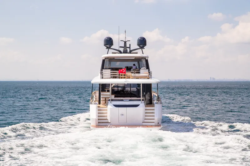 Slide: The Image of Luxury Sirena 78 yacht cruising on open sea, 2027 model. - 5