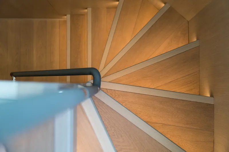 Slide: The Image of Spiral wooden staircase with modern design on Sirena 78 yacht, 2027 model. - 38