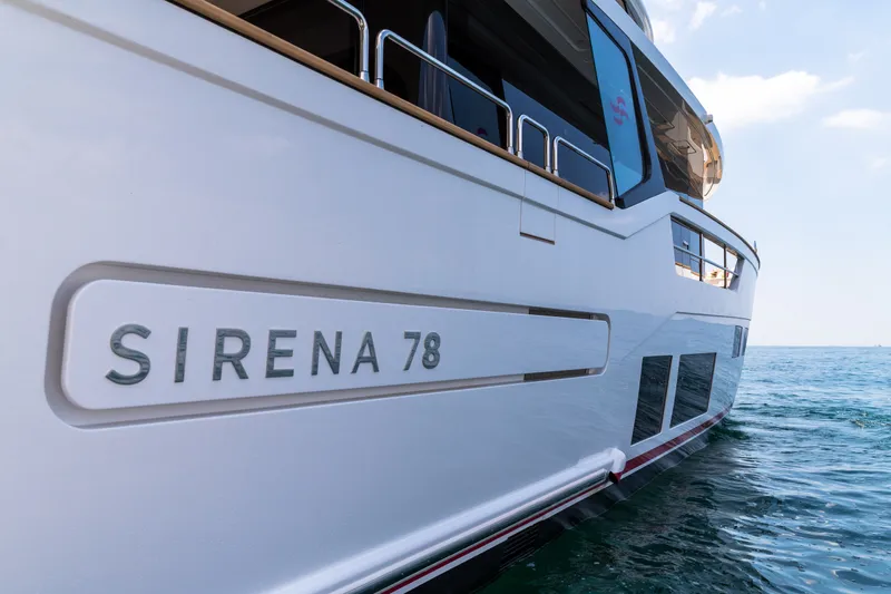 Slide: The Image of Luxury Sirena 78 yacht on the ocean, 2027 model, sleek design. - 12