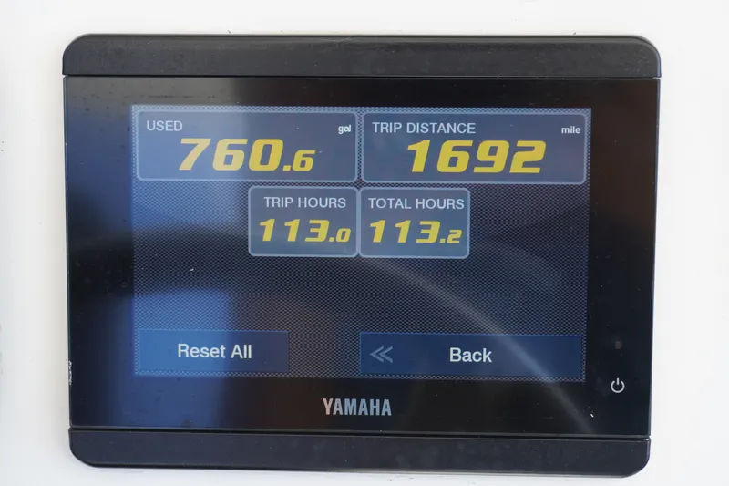 Slide: The Image of Yamaha display showing fuel usage and trip data for 2021 Regulator 24XO boat. - 32