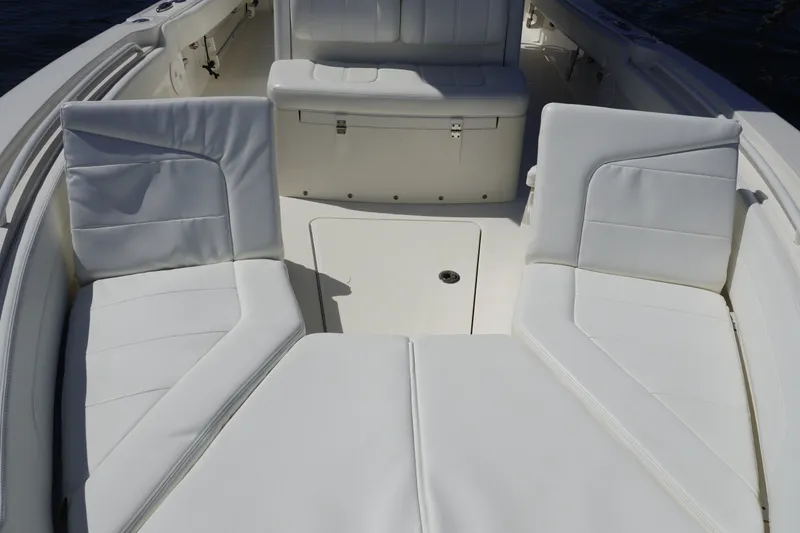 Slide: The Image of Luxurious white seating on 2021 Regulator 24XO boat, showcasing comfort and style. - 31