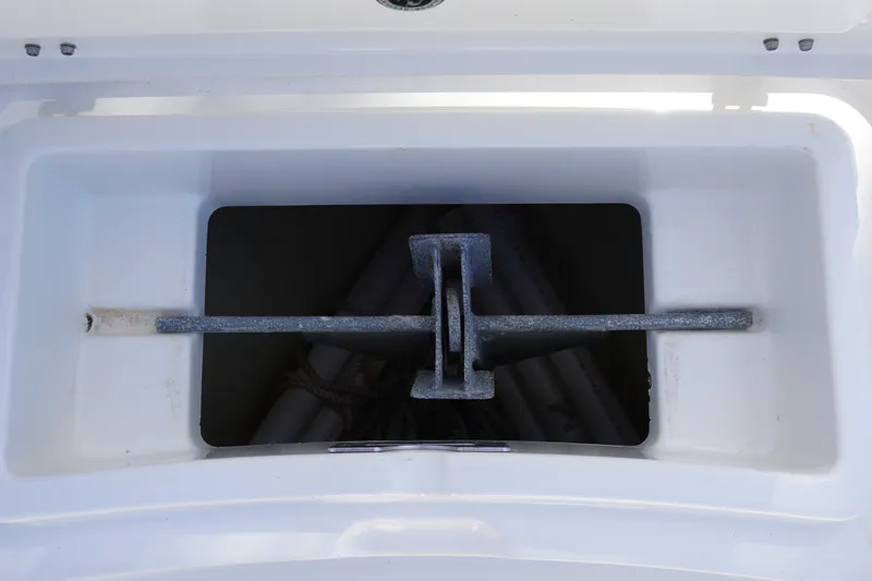 Slide: The Image of Anchor storage compartment on a 2021 Regulator 24XO boat. - 21
