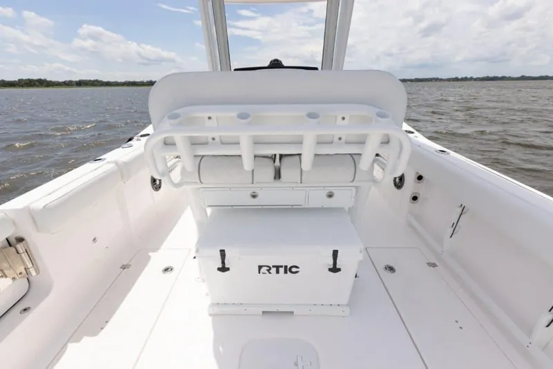Slide: The Image of Manufacturer Provided Image: 2025 Sea Fox 268 Commander boat interior with RTIC cooler on deck. - 18