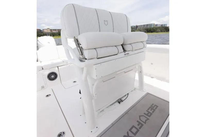 Slide: The Image of Manufacturer Provided Image: 2025 Sea Fox 268 Commander boat seating with white cushioned bench and sleek design. - 21