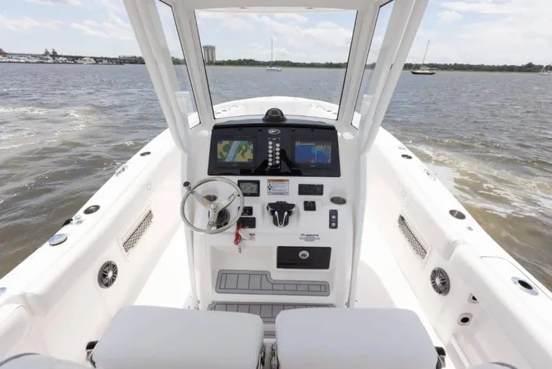 Slide: The Image of Manufacturer Provided Image: 2025 Sea Fox 268 Commander boat dashboard on open water. - 22