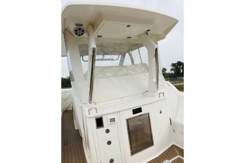 Slide: The Image of 2024 Regal 33 SAV boat interior with sleek cabinetry and modern design. - 24
