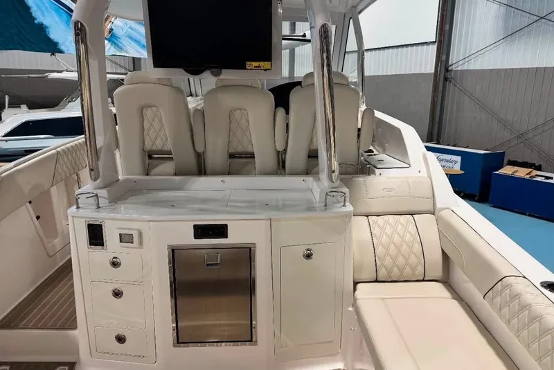 Slide: The Image of 2024 Regal 33 SAV luxury boat interior with plush seating and modern amenities. - 1