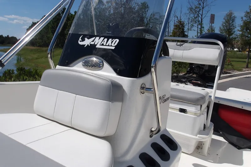 Slide: The Image of 2024 Mako Pro Skiff 17 CC boat interior with seating and console details. - 3