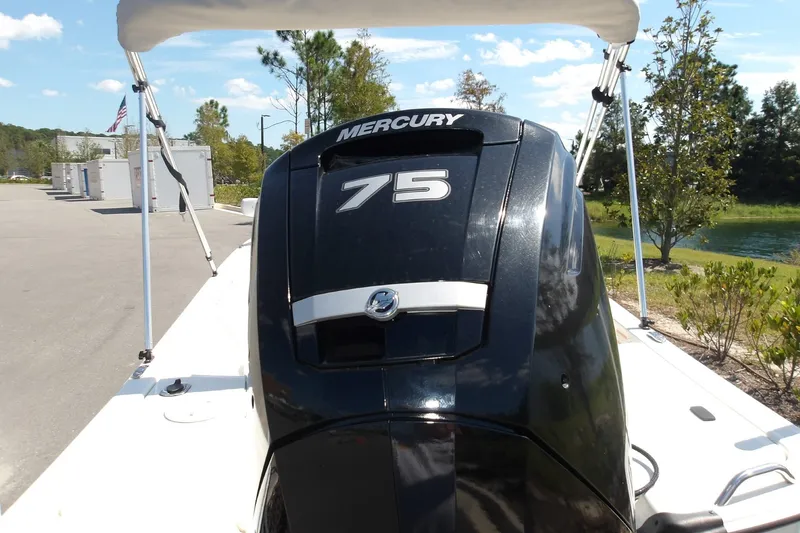 Slide: The Image of 2024 Mako Pro Skiff 17 CC with Mercury 75 outboard motor. - 10
