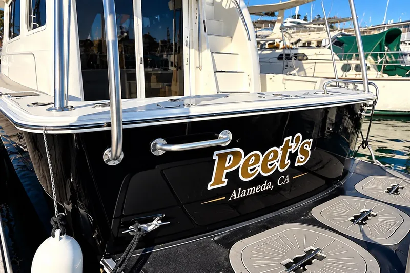 Slide: The Image of 2001 Mainship 390 Trawler named "Peet's" docked in Alameda, CA marina. - 7