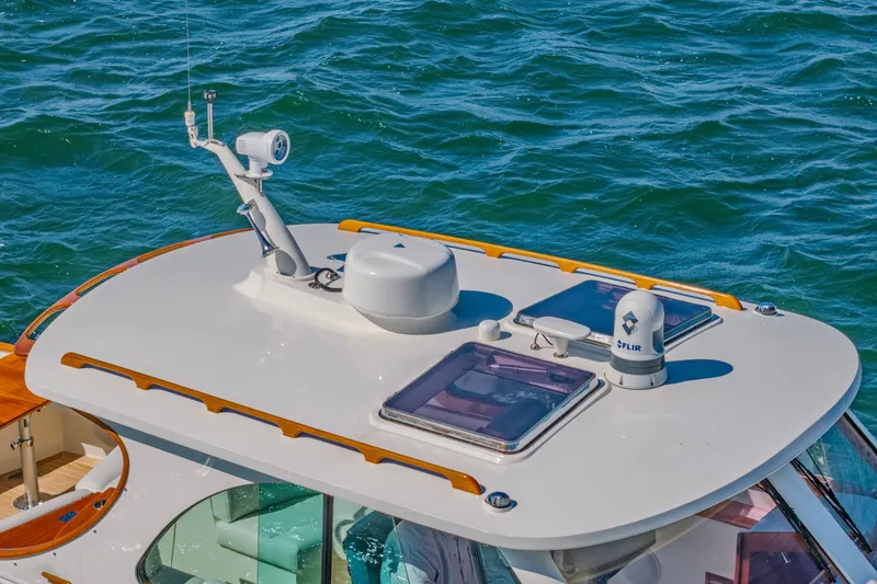 Slide: The Image of Rooftop view of 2021 Hinckley Picnic Boat 34 MKII on water. - 20
