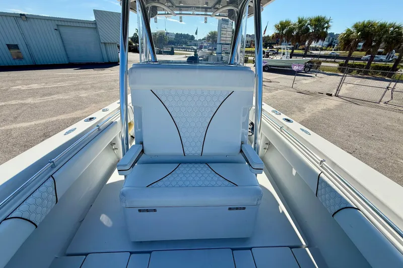 Slide: The Image of 2020 Contender 30 Tournament boat interior with white seating and hexagonal pattern. - 20