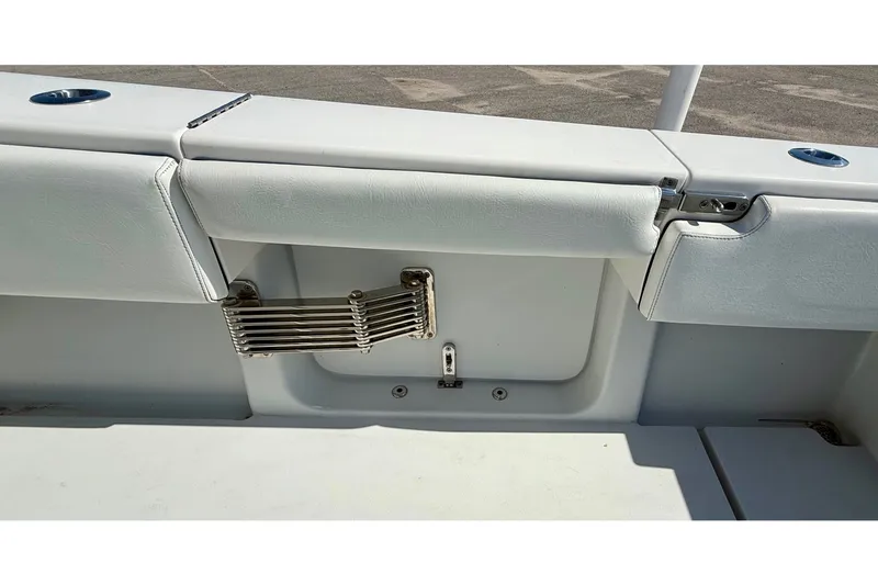 Slide: The Image of 2020 Contender 30 Tournament boat interior with foldable ladder and cushioned seating. - 16