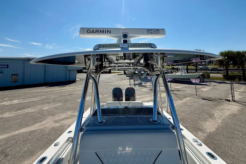 Slide: The Image of 2020 Contender 30 Tournament boat with Garmin xHD2 radar, parked outdoors. - 22