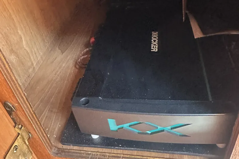 Slide: The Image of Kicker amplifier installed in a 1985 Tiara Yachts 2700 Continental cabinet. - 24