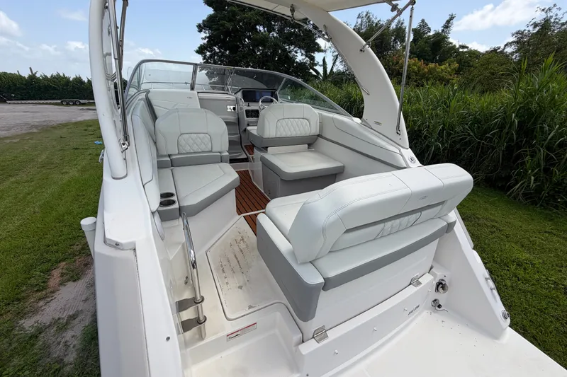 Slide: The Image of 2023 Regal 26 XO boat interior with white seating and sleek design. - 5