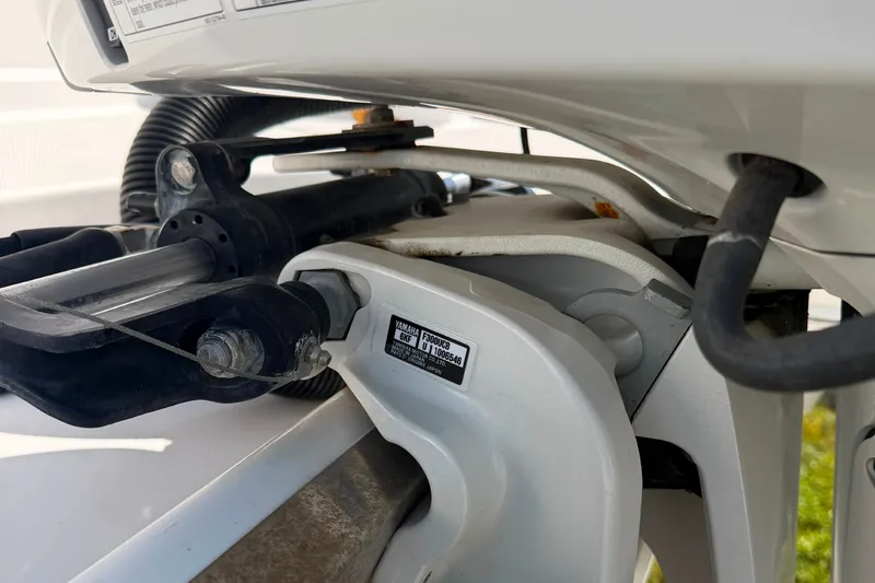Slide: The Image of Close-up of 2023 Regal 26 XO boat engine components and wiring. - 15