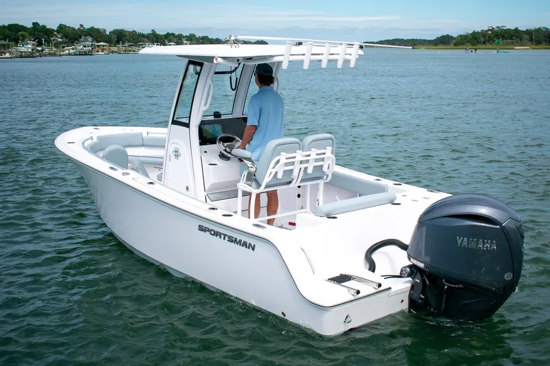 Slide: The Image of 2026 Sportsman Open 212 Center Console boat on water, featuring Yamaha outboard motor. - 5