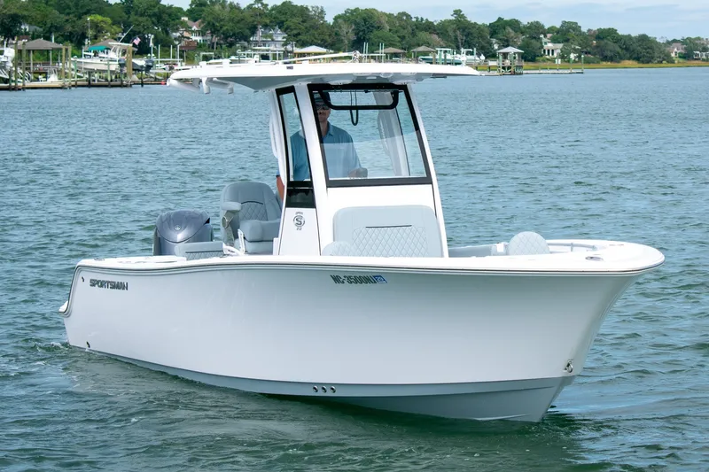 The Image of 2026 Sportsman Open 212 Center Console boat cruising on a calm waterway. - 0