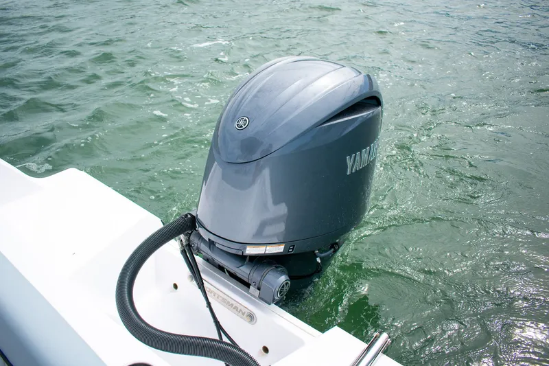 Slide: The Image of 2026 Sportsman Open 212 Center Console with Yamaha outboard motor on water. - 20