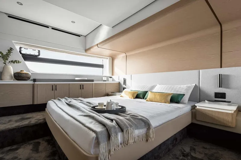 Slide: The Image of Manufacturer Provided Image: Luxurious bedroom interior of 2025 Azimut Fly 53 yacht with modern design and elegant decor. - 13