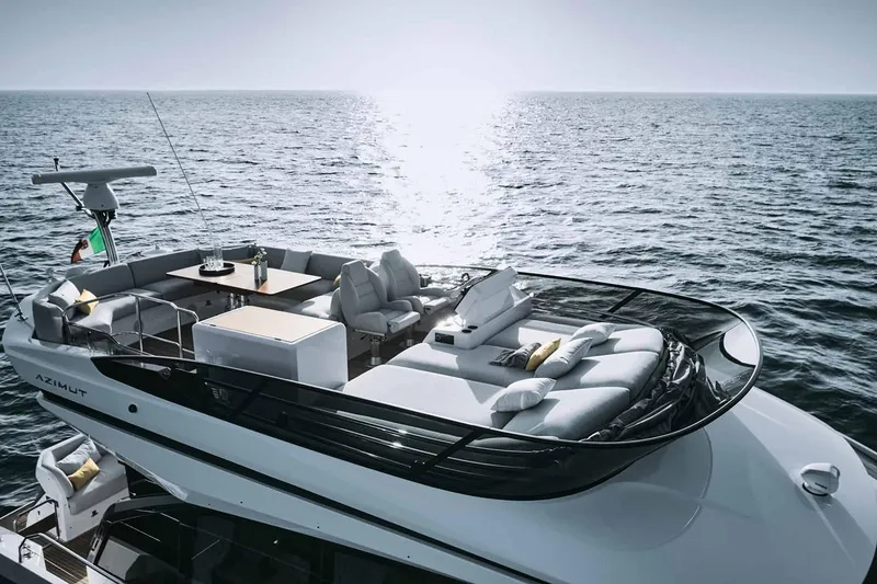 Slide: The Image of Manufacturer Provided Image: Luxurious 2025 Azimut Fly 53 yacht on open sea, featuring elegant deck seating. - 4
