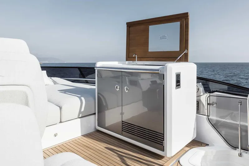 Slide: The Image of Manufacturer Provided Image: Luxurious Azimut Fly 53 yacht deck with sleek cabinetry, 2025 model, ocean view. - 6
