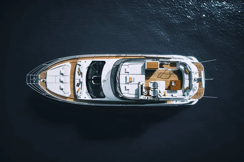 Slide: The Image of Manufacturer Provided Image: Azimut Fly 53 yacht 2025, aerial view, sleek design, luxurious deck, open water. - 2