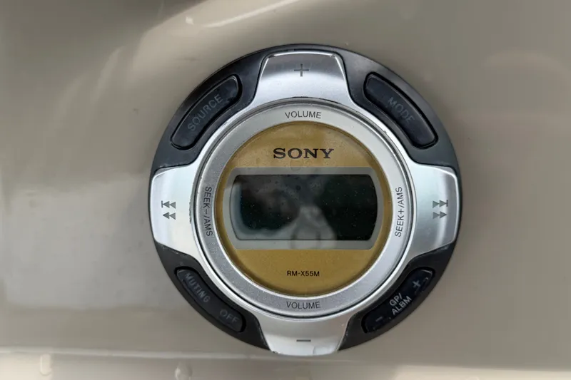 Slide: The Image of Sony RM-X55M marine audio control on 2009 Sea Ray 240 Sundancer boat dashboard. - 43