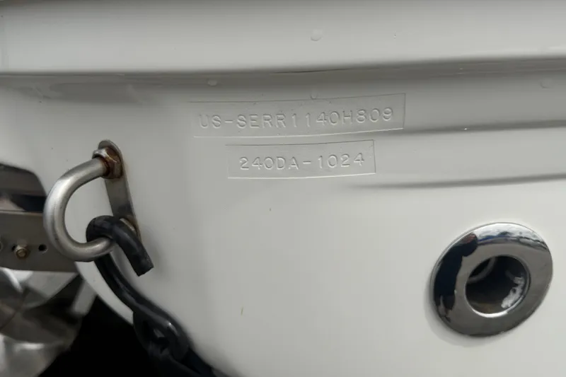 Slide: The Image of 2009 Sea Ray 240 Sundancer hull identification number and fittings close-up. - 99
