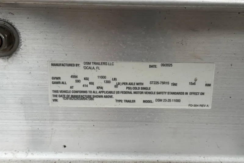 Slide: The Image of Label on DSM Trailers LLC, Ocala, FL, manufactured in 09/2025, for Sea Ray 240 Sundancer 2009. - 30