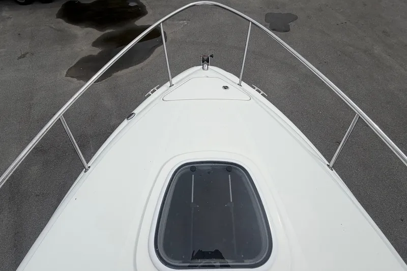 Slide: The Image of Foredeck of a 2009 Sea Ray 240 Sundancer with hatch and railing. - 46