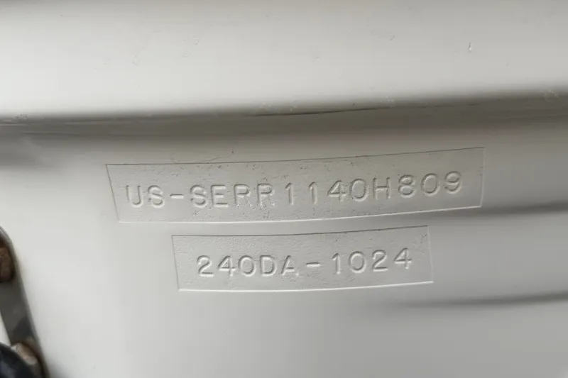 Slide: The Image of Hull identification number on a 2009 Sea Ray 240 Sundancer boat. - 29