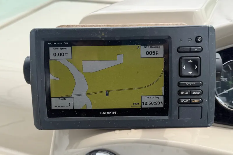 Slide: The Image of Garmin GPS display on 2009 Sea Ray 240 Sundancer boat, showing navigation map and speed. - 39