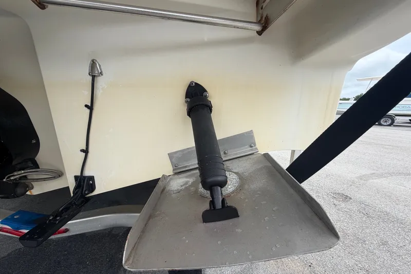 Slide: The Image of Trim tab and hydraulic actuator on a 2009 Sea Ray 240 Sundancer boat. - 7