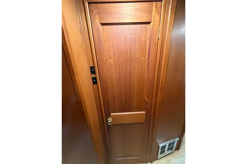 Slide: The Image of Wooden interior door on 1986 Viking 48 Motor Yacht. - 22
