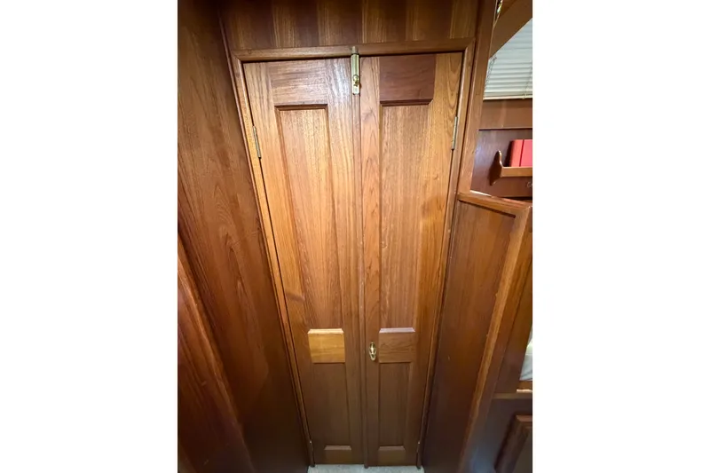 Slide: The Image of Wooden interior door on a 1986 Viking 48 Motor Yacht. - 20