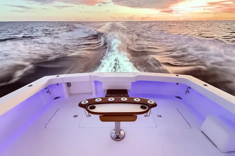 Slide: The Image of Viking 52 Convertible yacht cruising at sunset, 2002 model, ocean view. - 55
