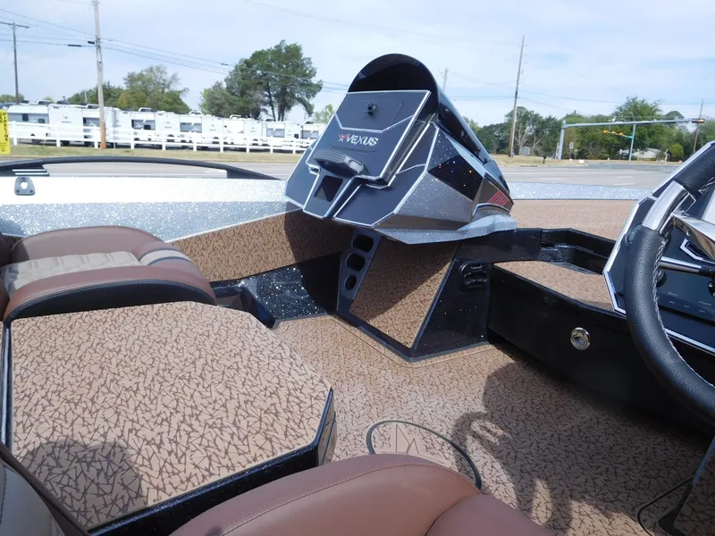 Slide: The Image of The image shows the cockpit of a 2027 Vexus VXs21 boat with modern controls. - 15