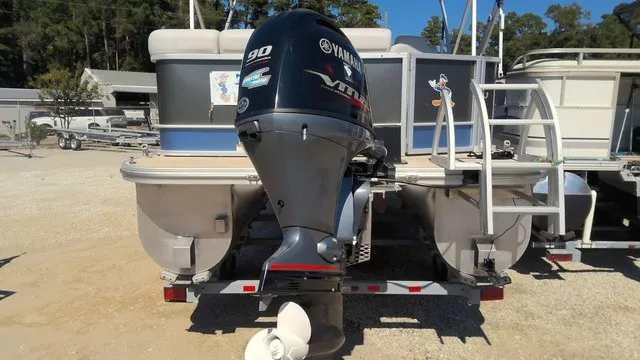 The Image of A 2023 SunCatcher Select 20C pontoon boat with a Yamaha 90 HP outboard motor. - 1