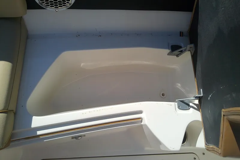 Slide: The Image of Interior view of a 2015 Sea Ray SDX 270 Outboard boat's seating area. - 35