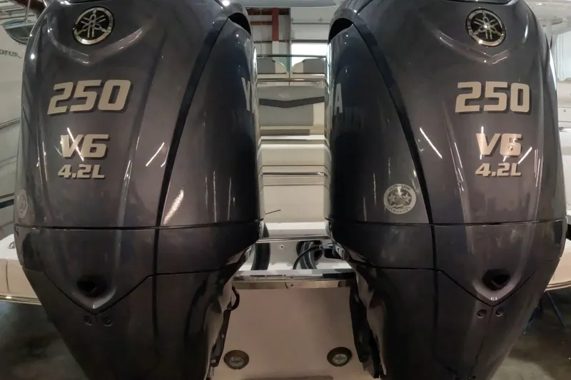 Slide: The Image of Twin Yamaha 250 V6 4.2L engines on a 2023 Chaparral 280 OSX boat. - 13