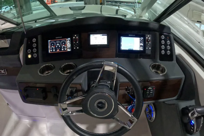 Slide: The Image of Dashboard of 2023 Chaparral 280 OSX boat with advanced navigation displays. - 20
