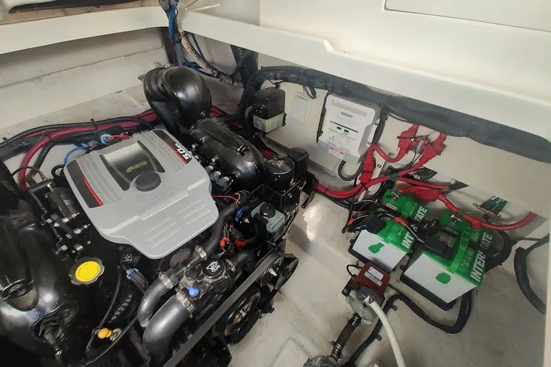 Slide: The Image of Engine room of 2012 Sea Ray Sundancer 310 with batteries and wiring. - 32