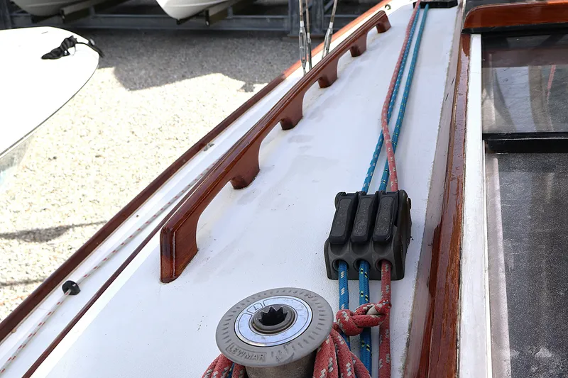 Slide: The Image of Deck of 1995 Alerion Express 28 sailboat with winch and colorful ropes. - 19