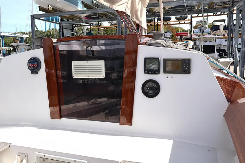 Slide: The Image of Cockpit of a 1995 Alerion Express 28 sailboat with navigation instruments. - 13