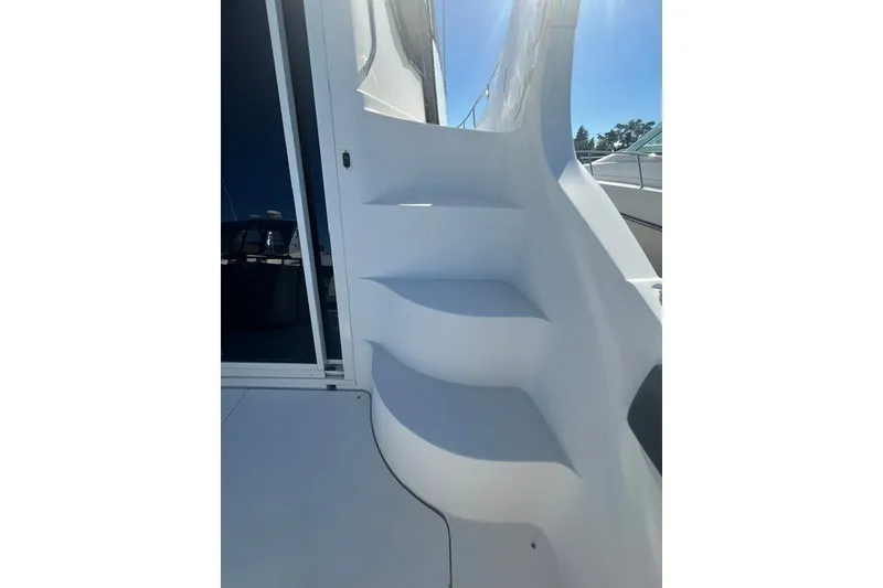 Slide: The Image of Staircase on a 2005 Carver 360 Mariner yacht under bright sunlight. - 5