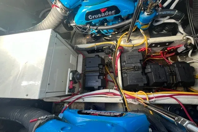 Slide: The Image of Engine compartment of a 2005 Carver 360 Mariner with Crusader engines and wiring. - 62