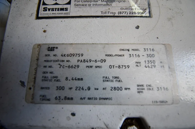 Slide: The Image of Caterpillar engine specifications label for Mainship 390 Trawler, model year 2000. - 58